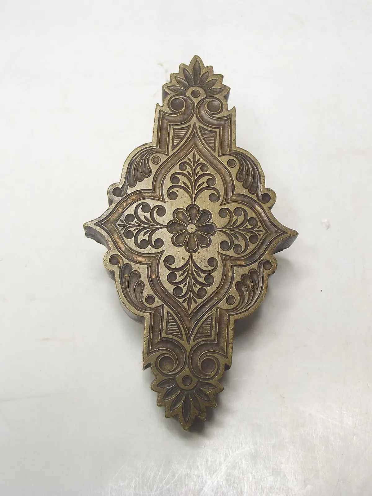 Grabado en bronce