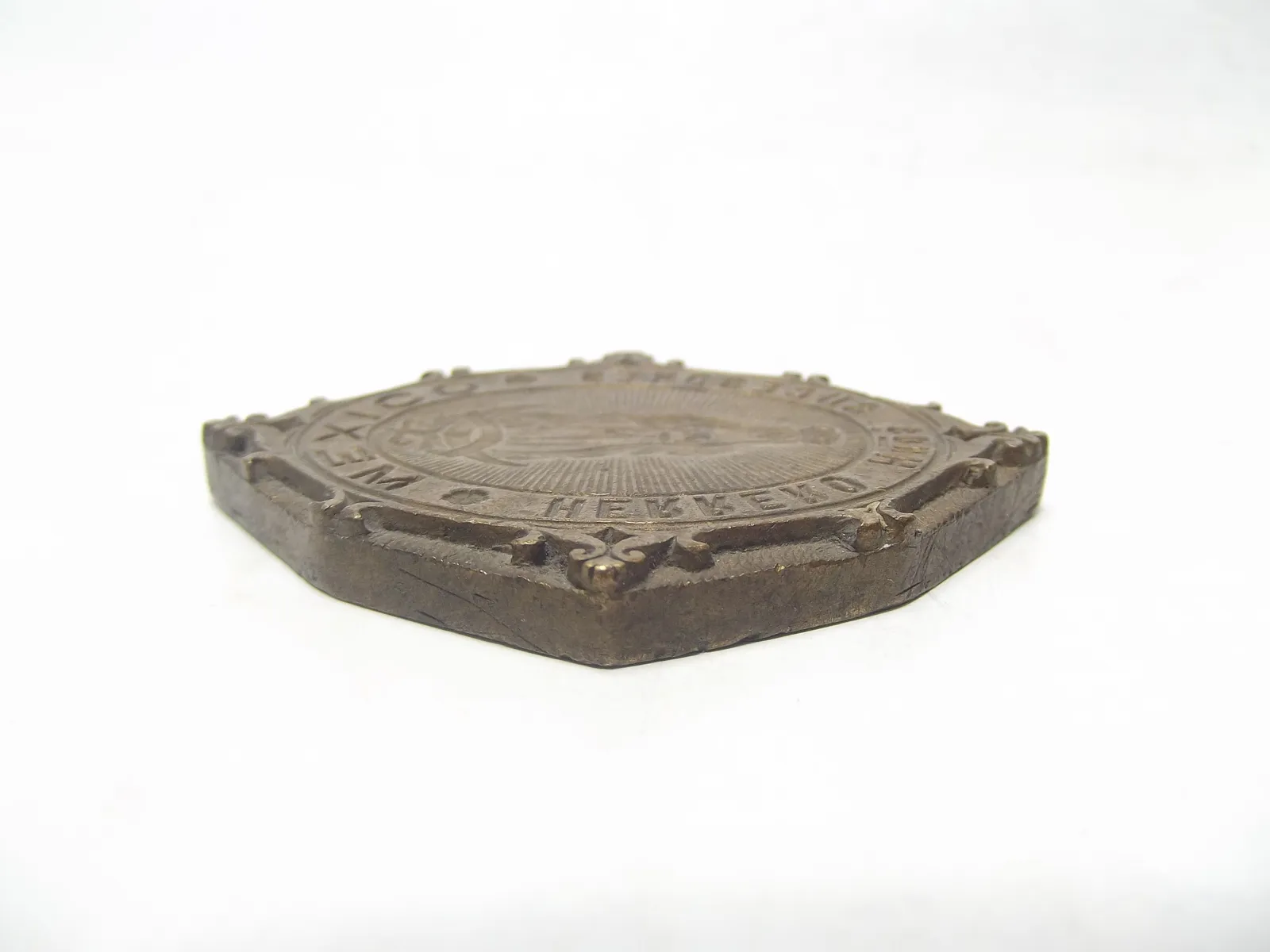 Sello de bronce