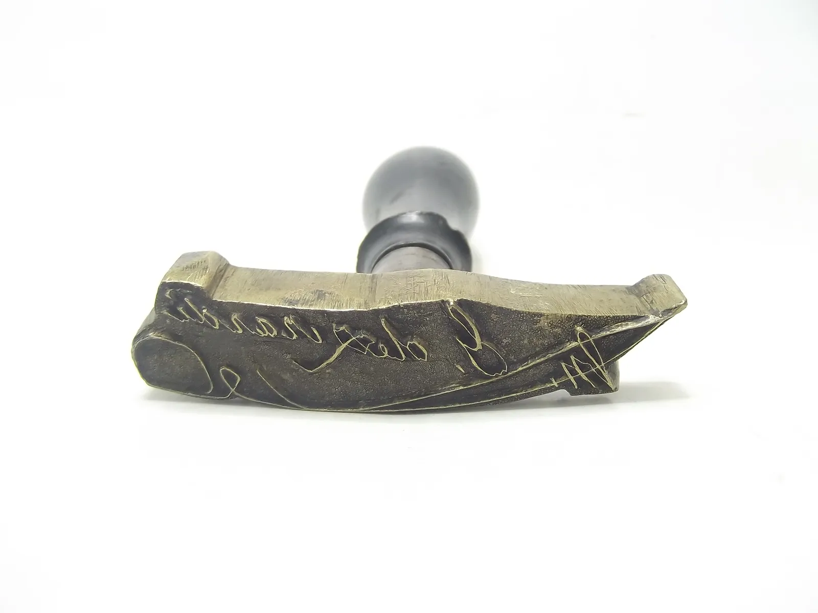 Sello de bronce
