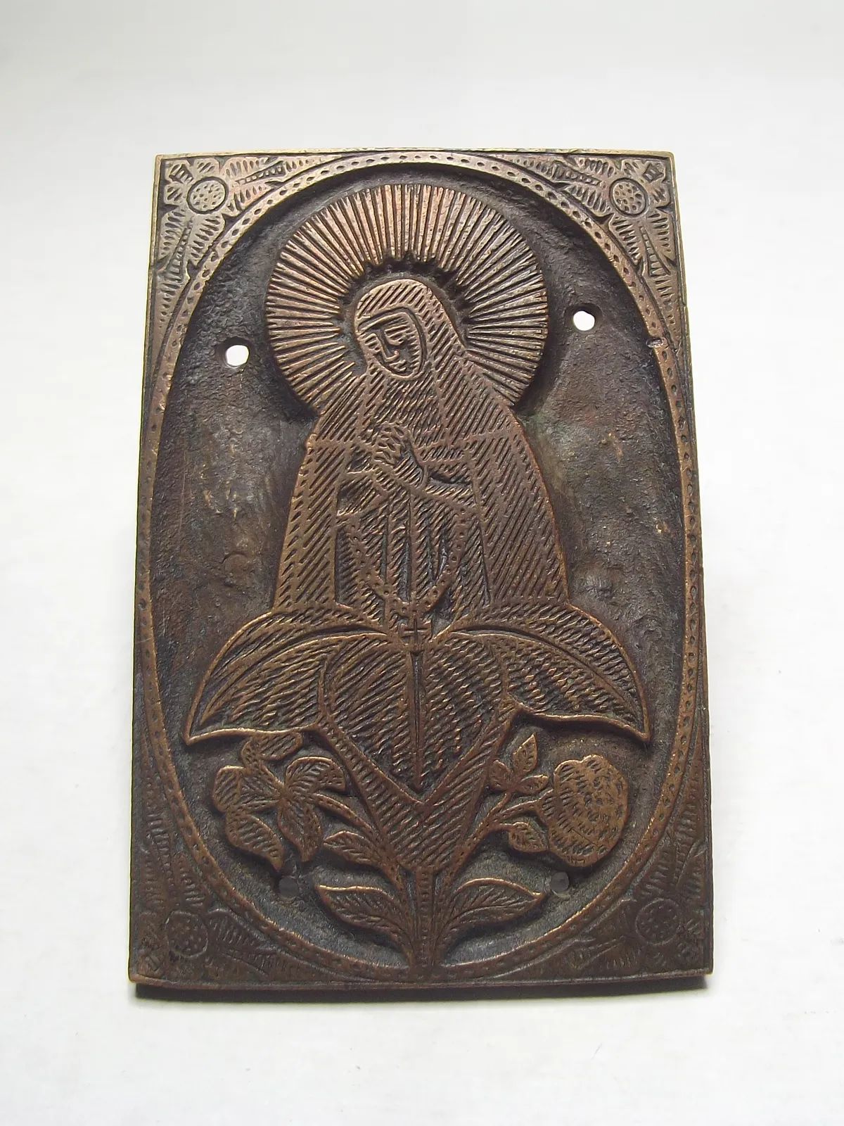 Grabado en bronce