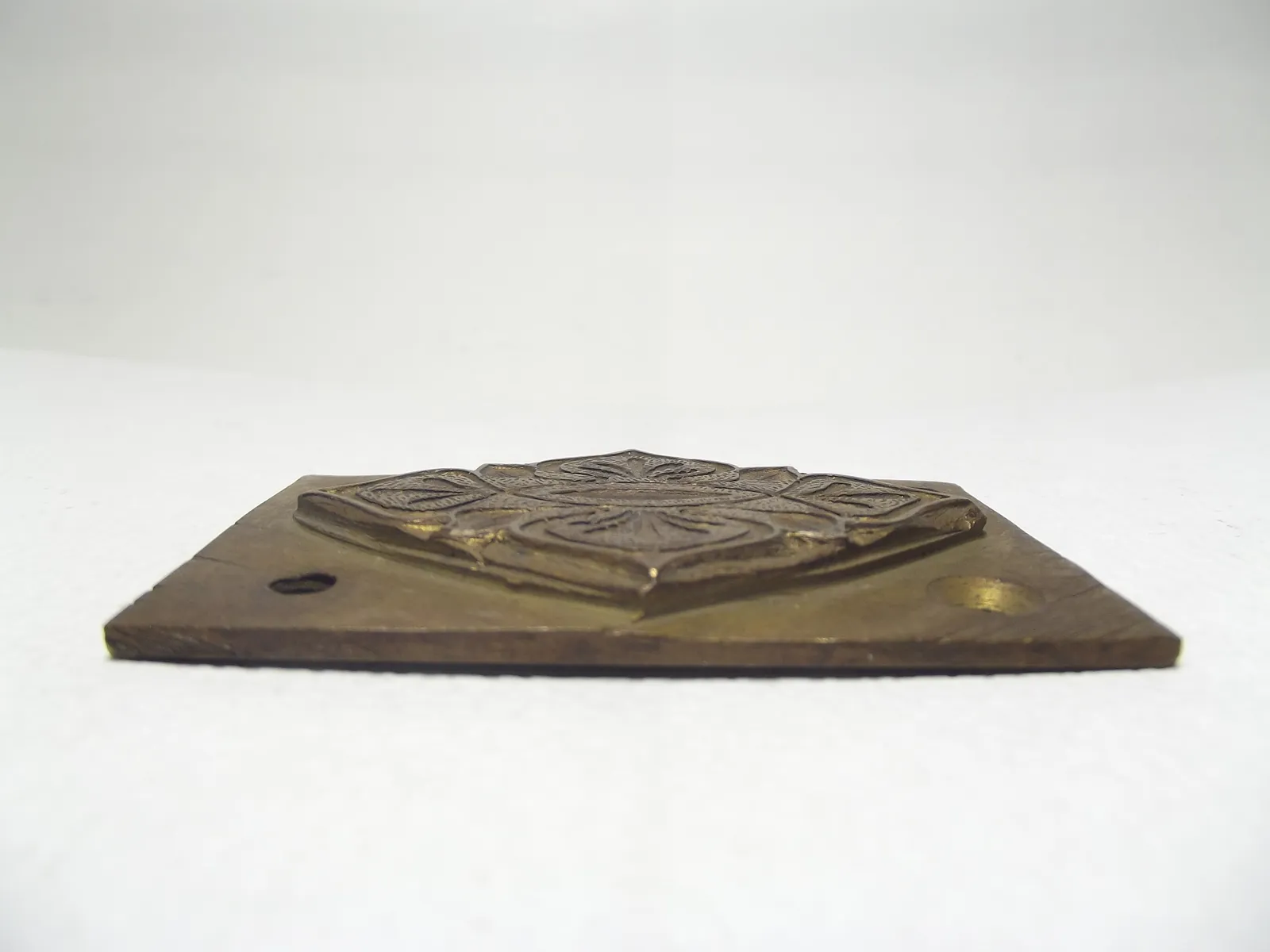 Grabado en bronce