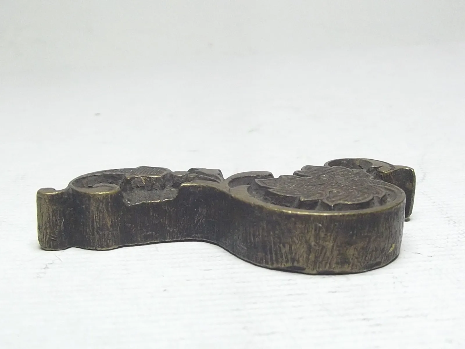 Sello de bronce