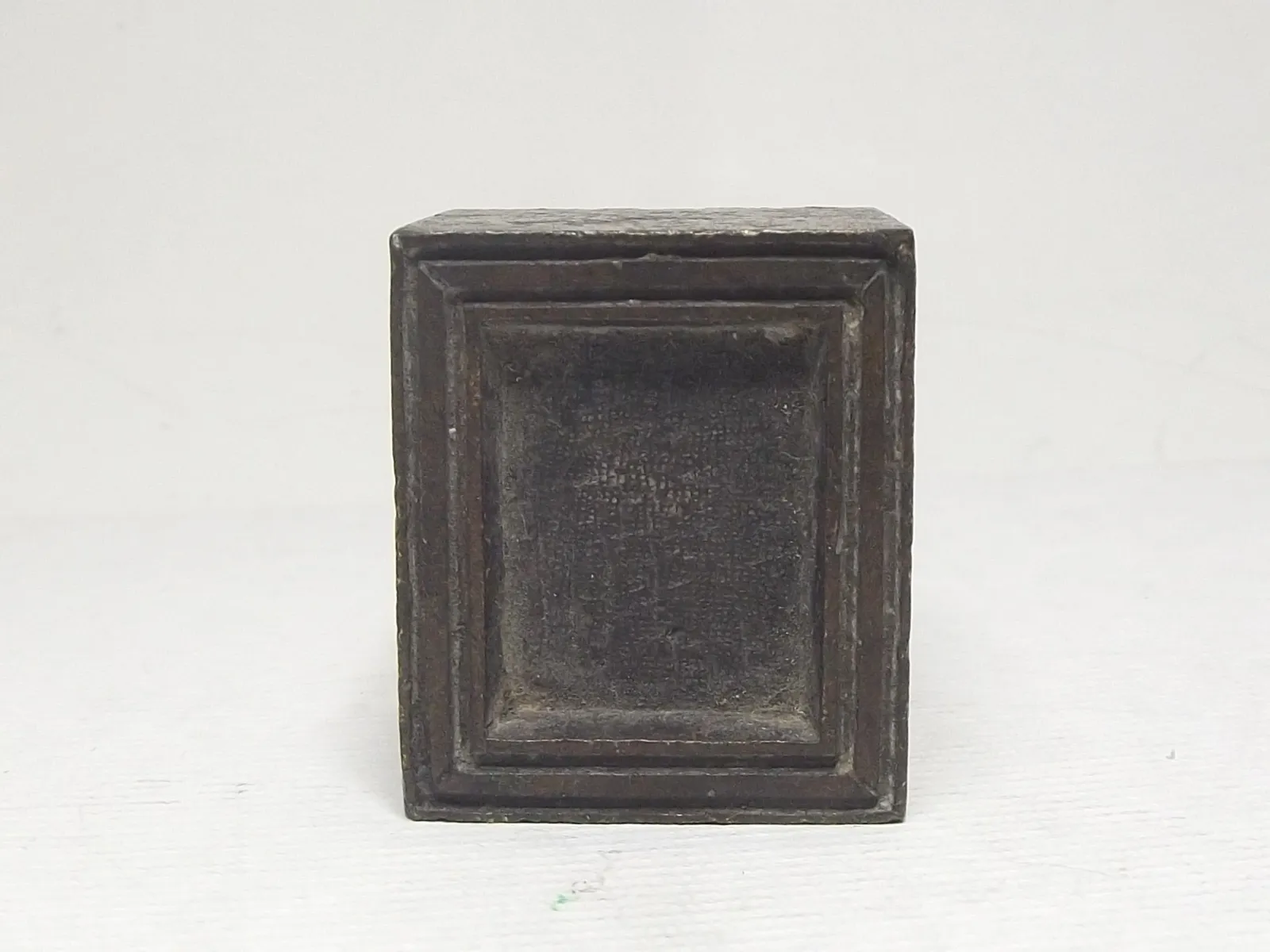 Sello de bronce