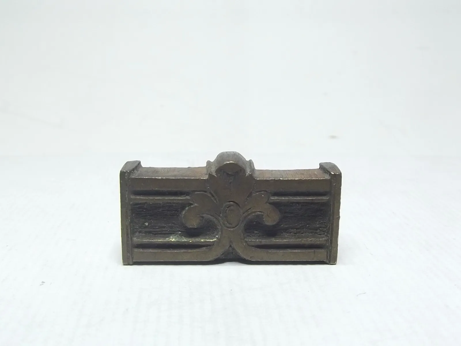 Sello de bronce