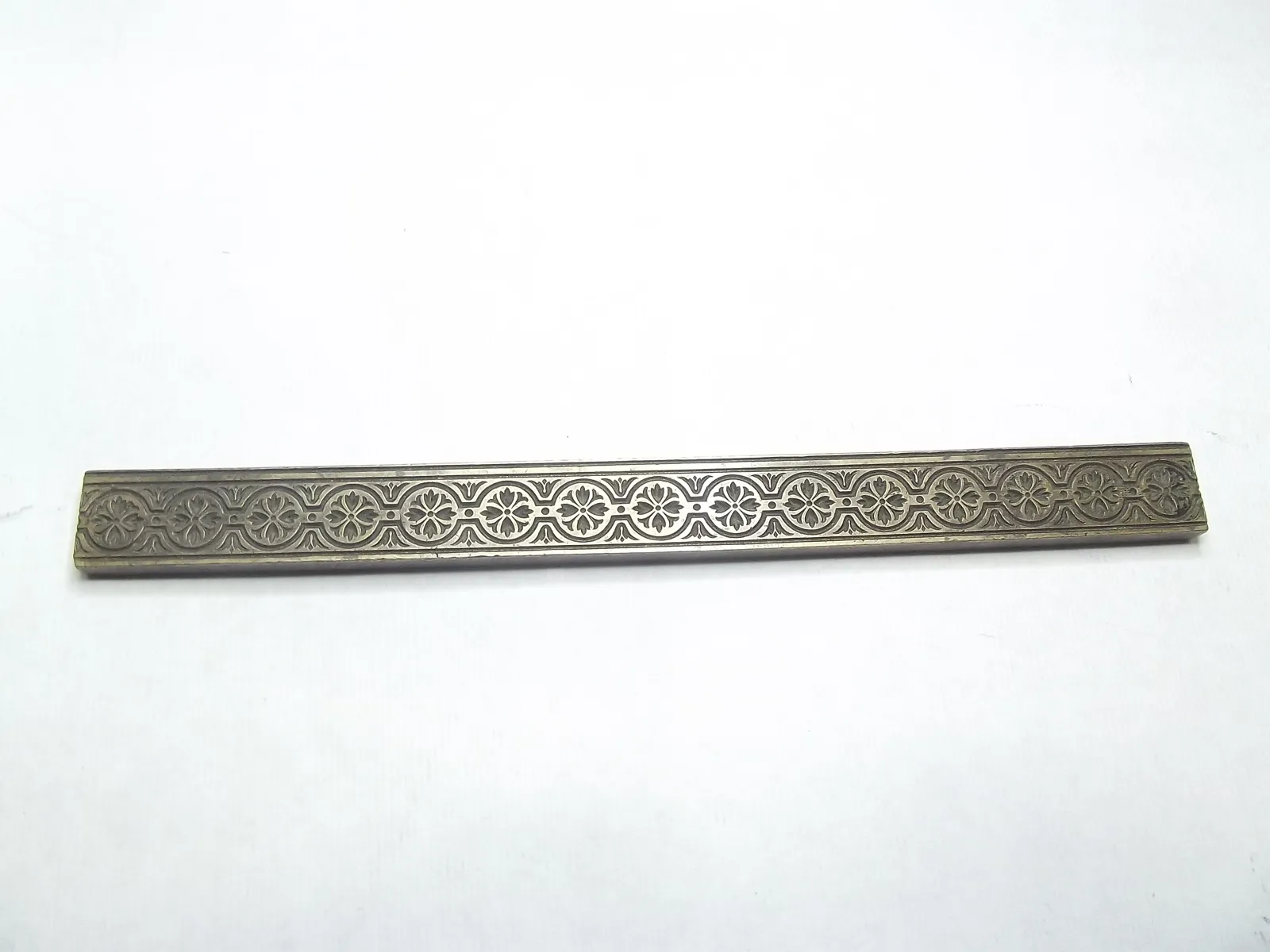 Sello de bronce