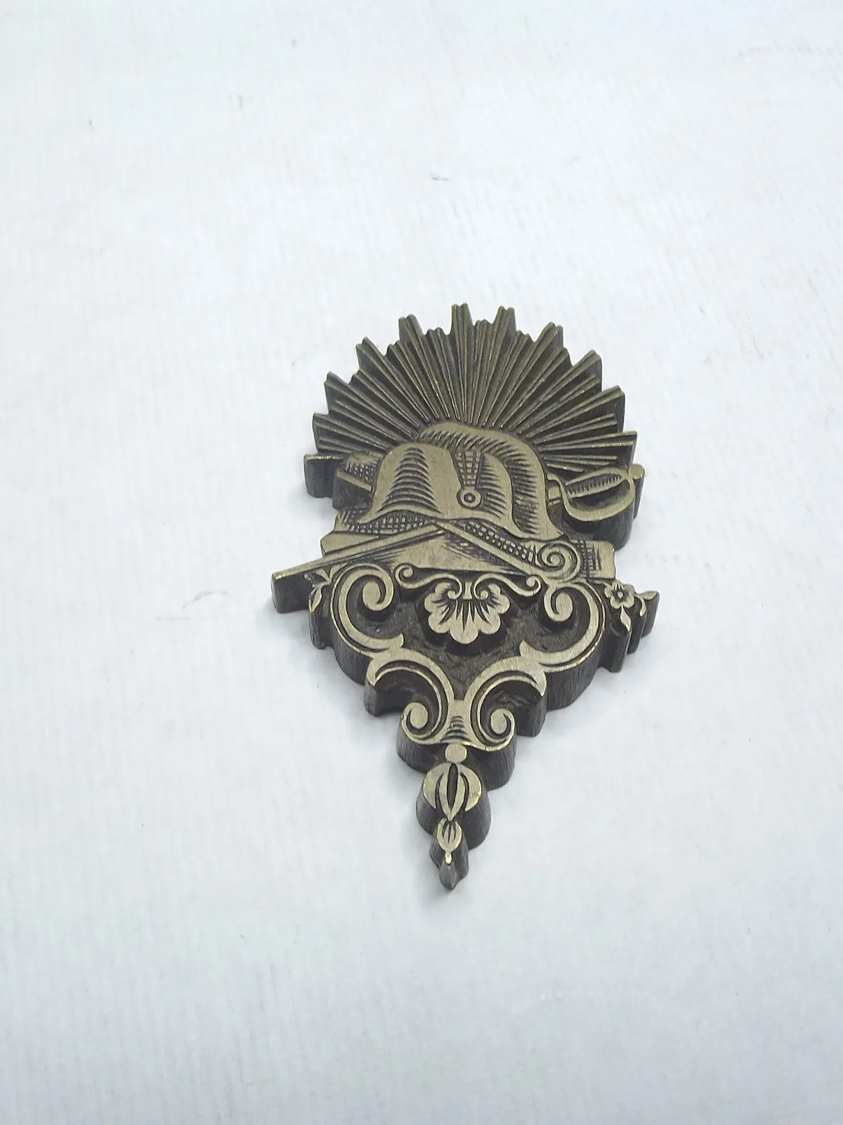 Sello de bronce