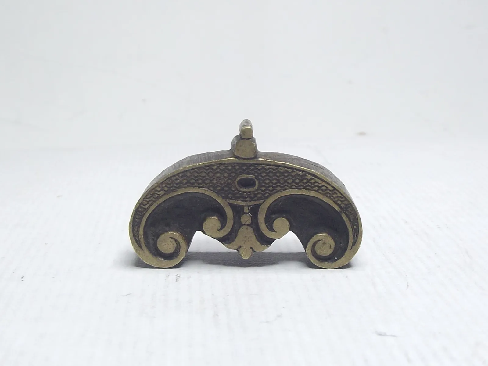 Sello de bronce