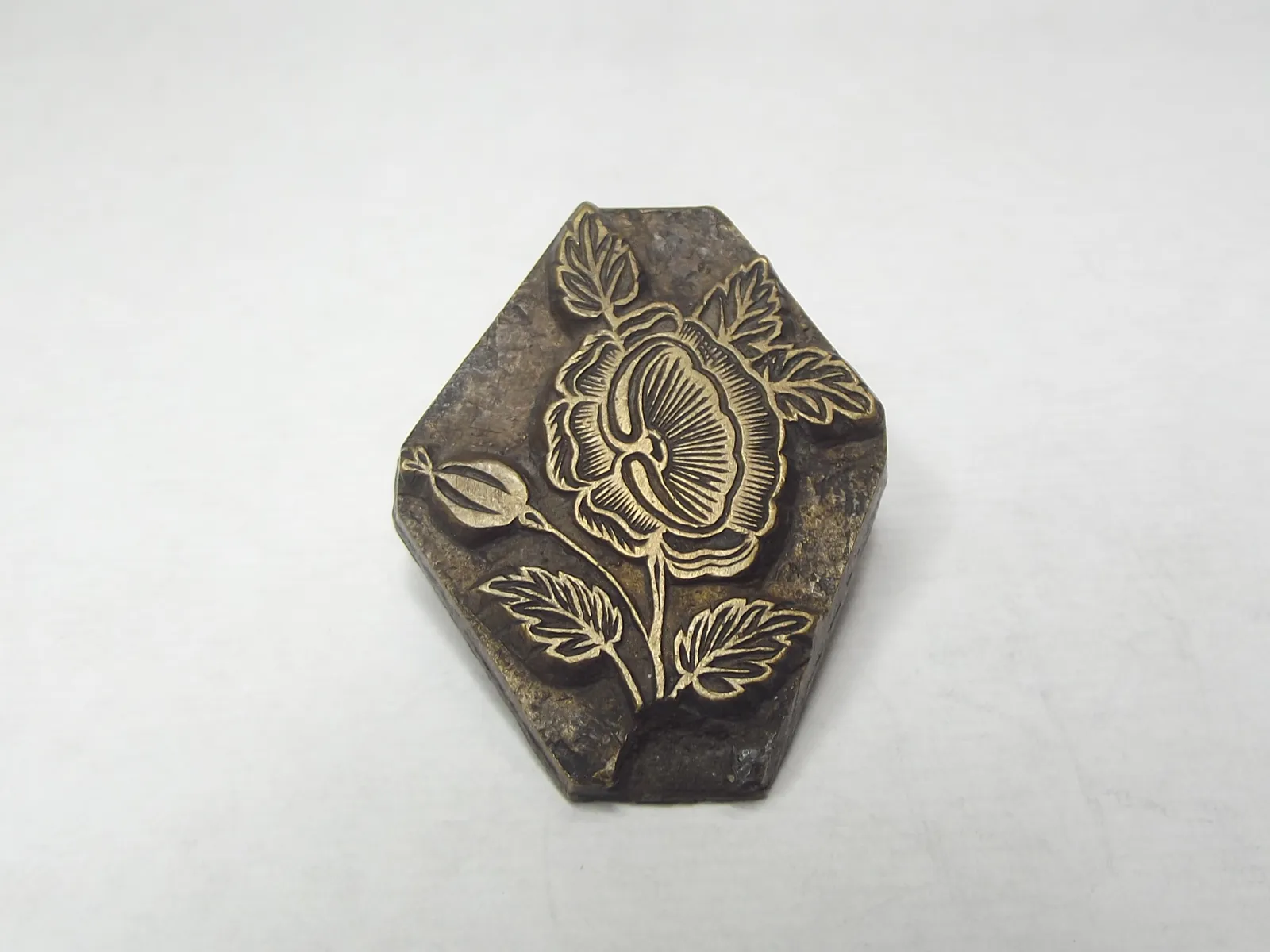 Sello de bronce
