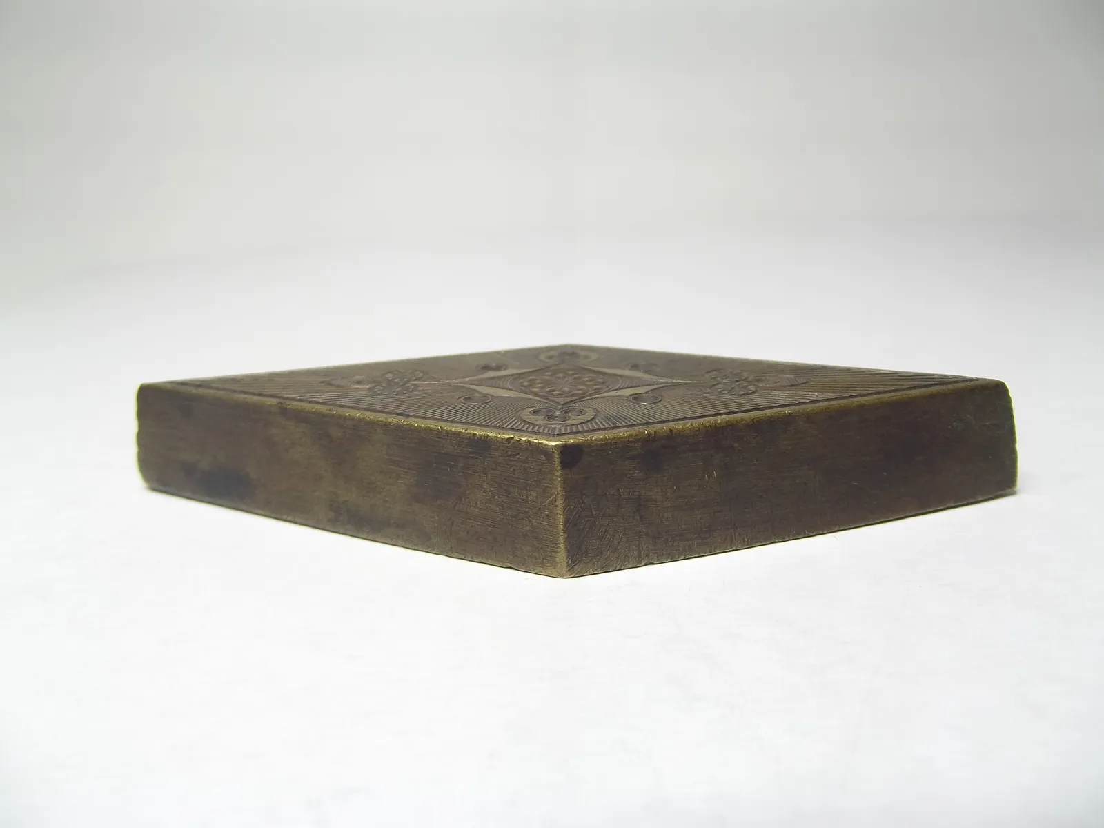 Sello de bronce