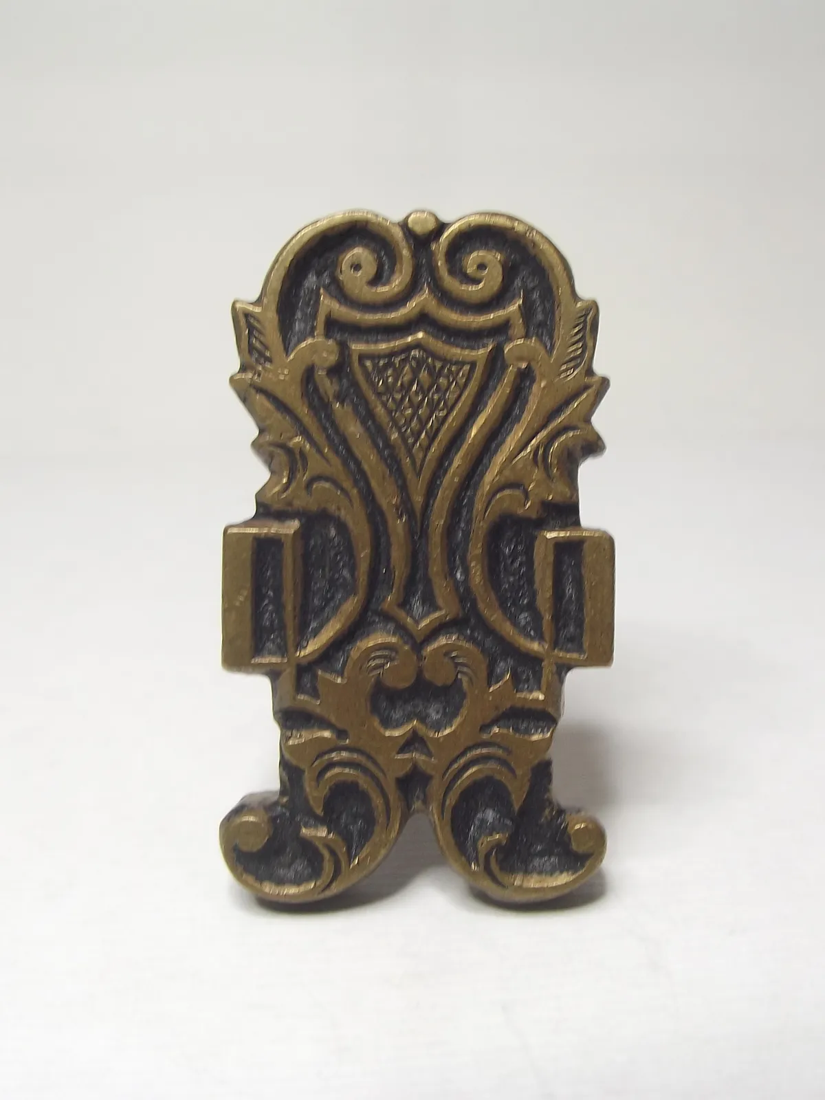 Sello de bronce