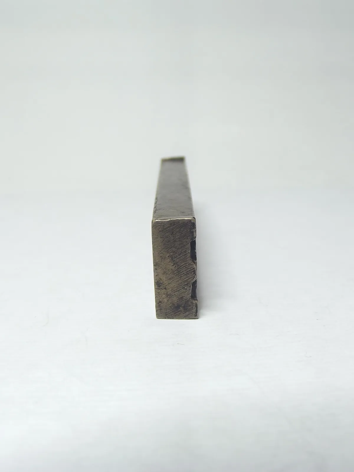 Sello de bronce