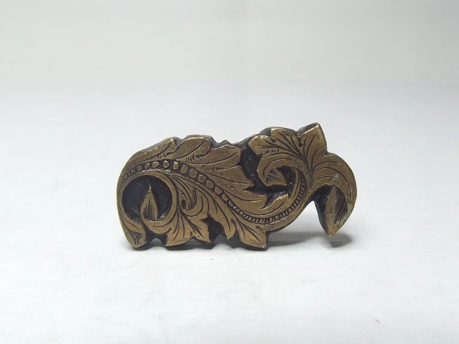 Sello de bronce