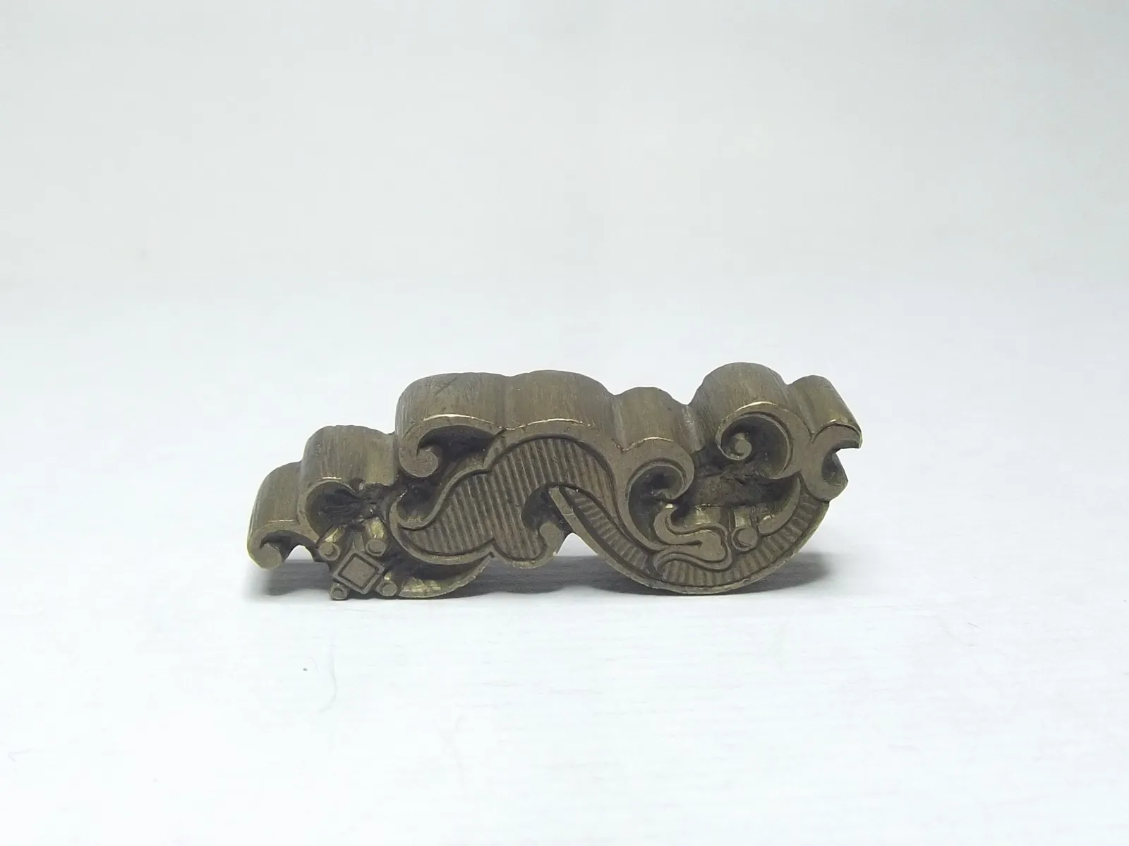Sello de bronce