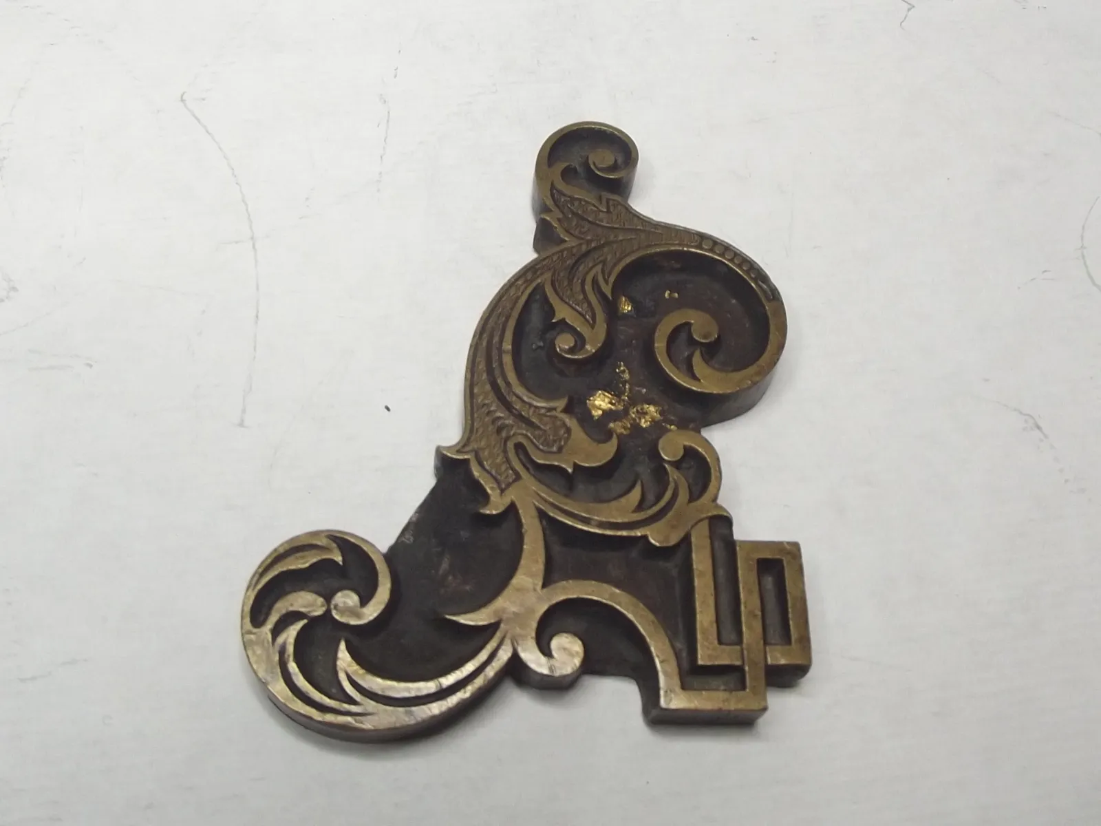 Sello de bronce