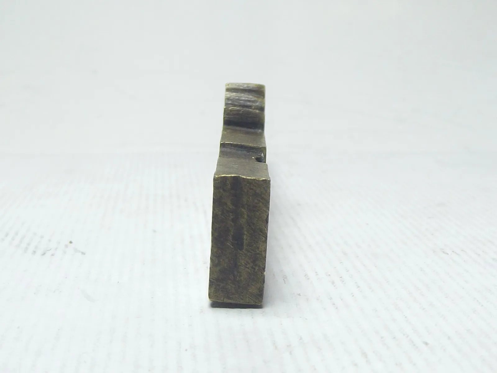 Sello de bronce
