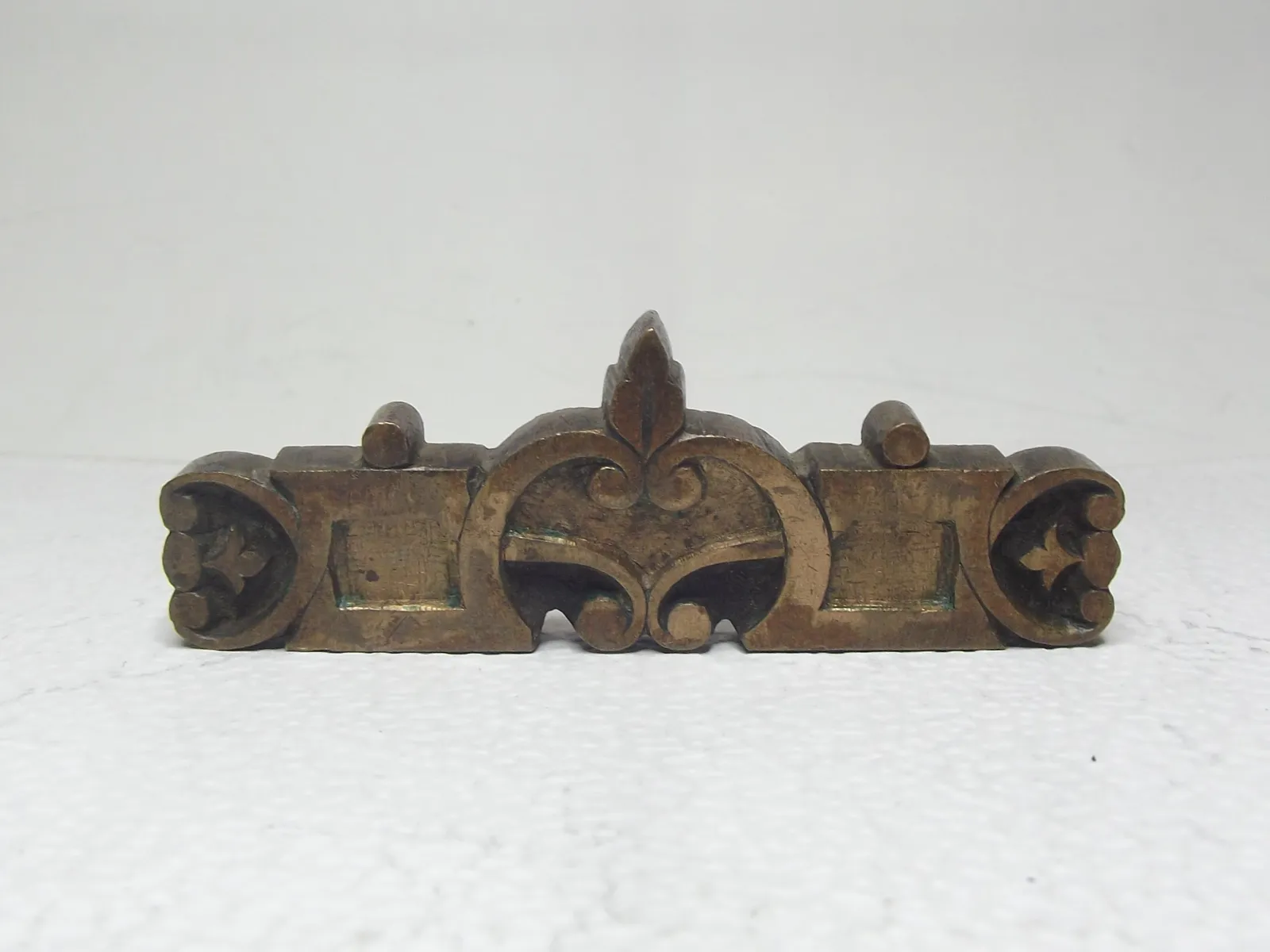 Sello de bronce