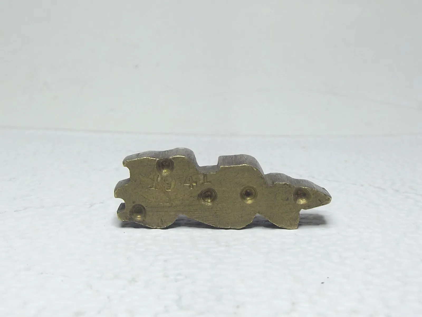 Sello de bronce
