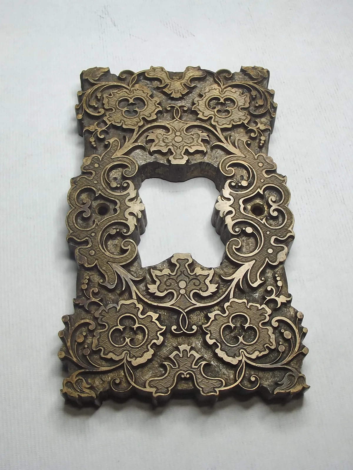 Grabado en bronce