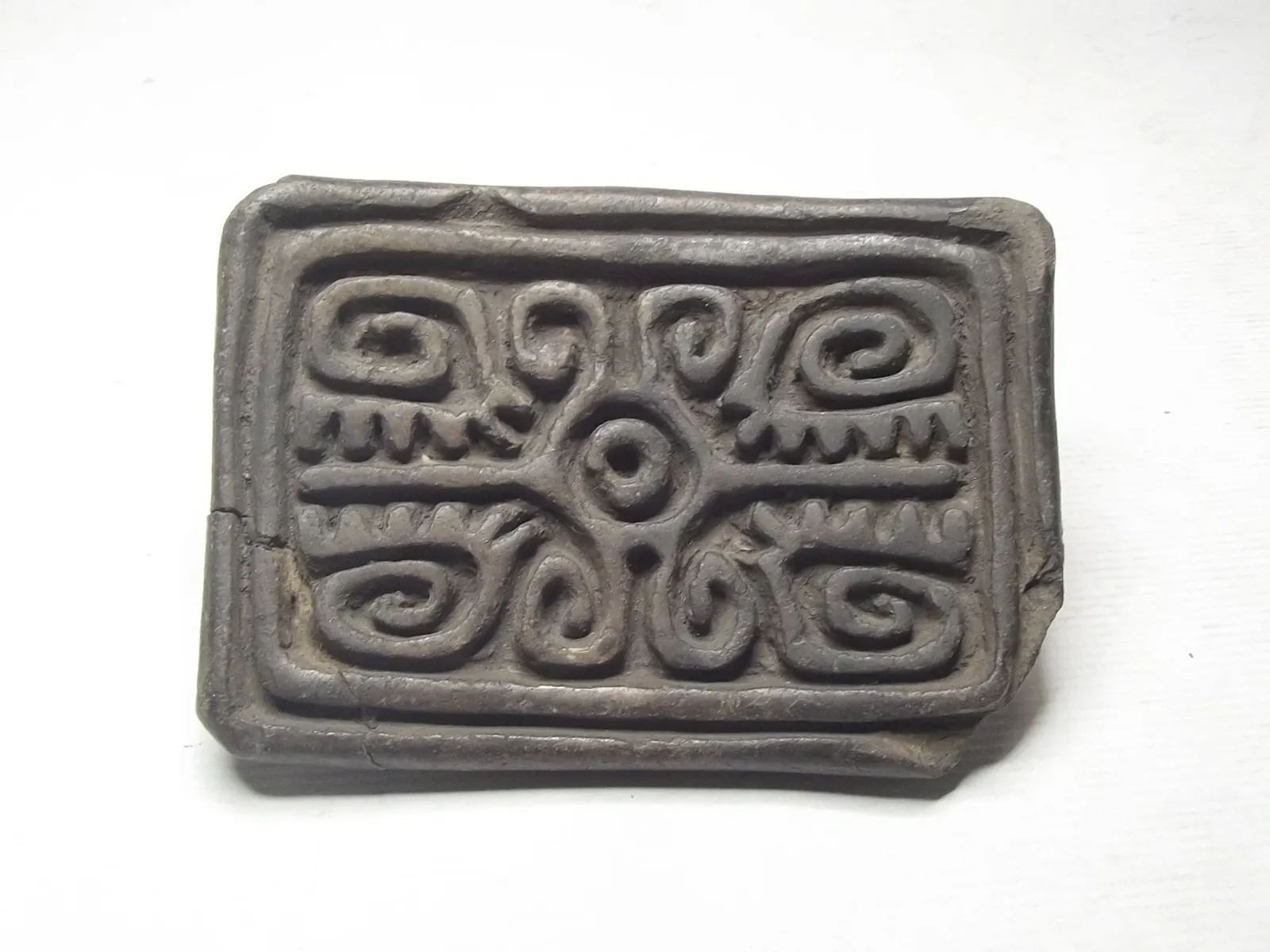 Sello de barro cocido