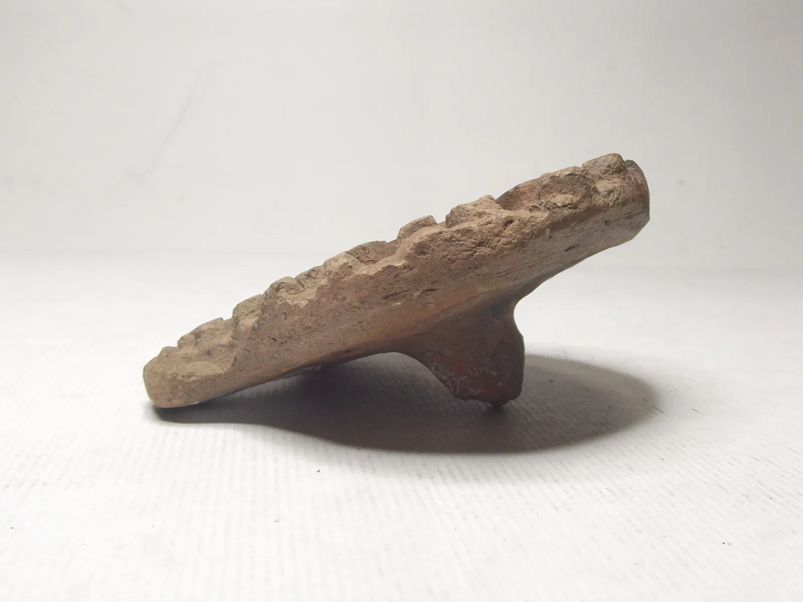 Sello de barro cocido