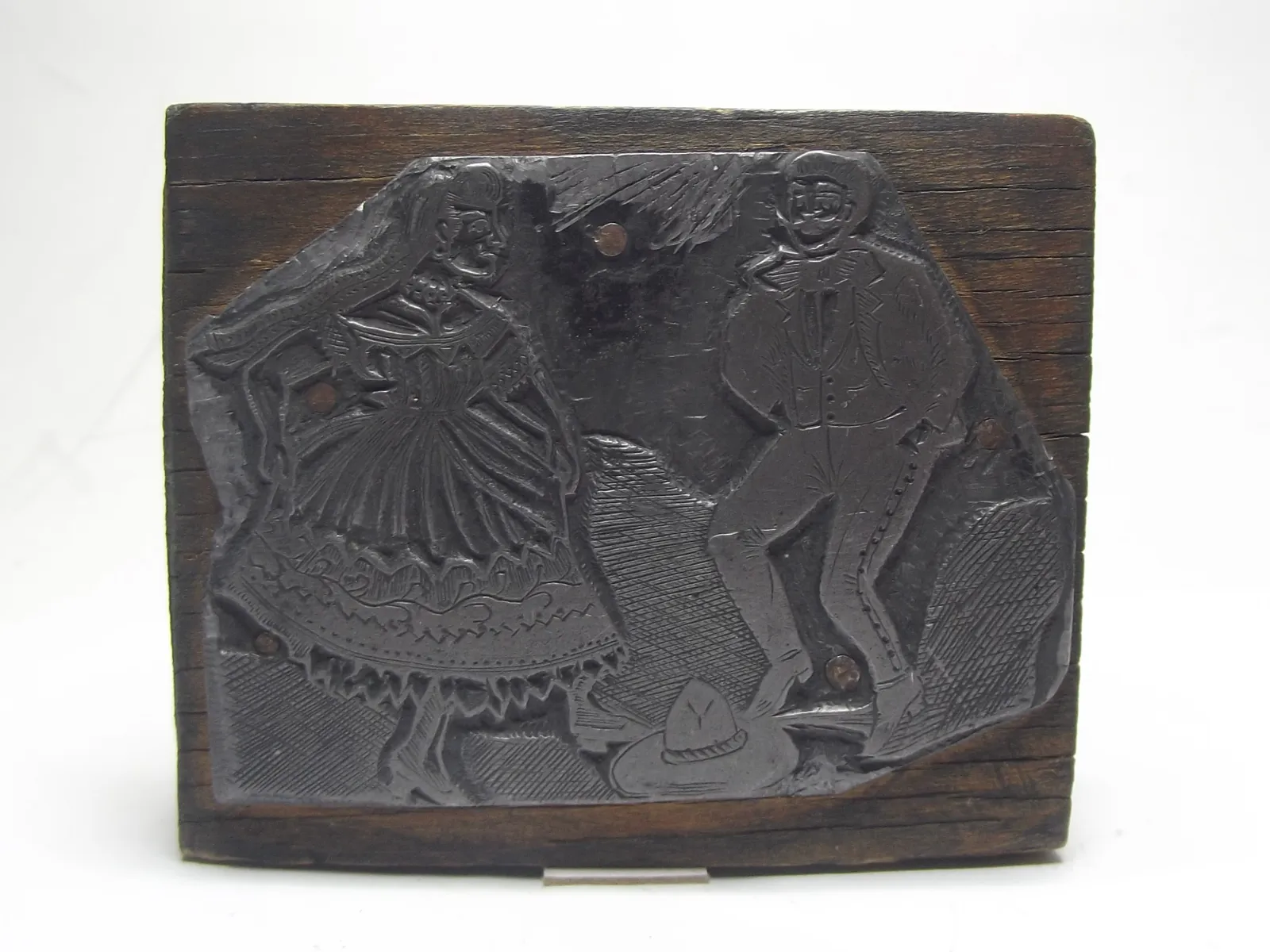 Grabado en plomo con base de madera
