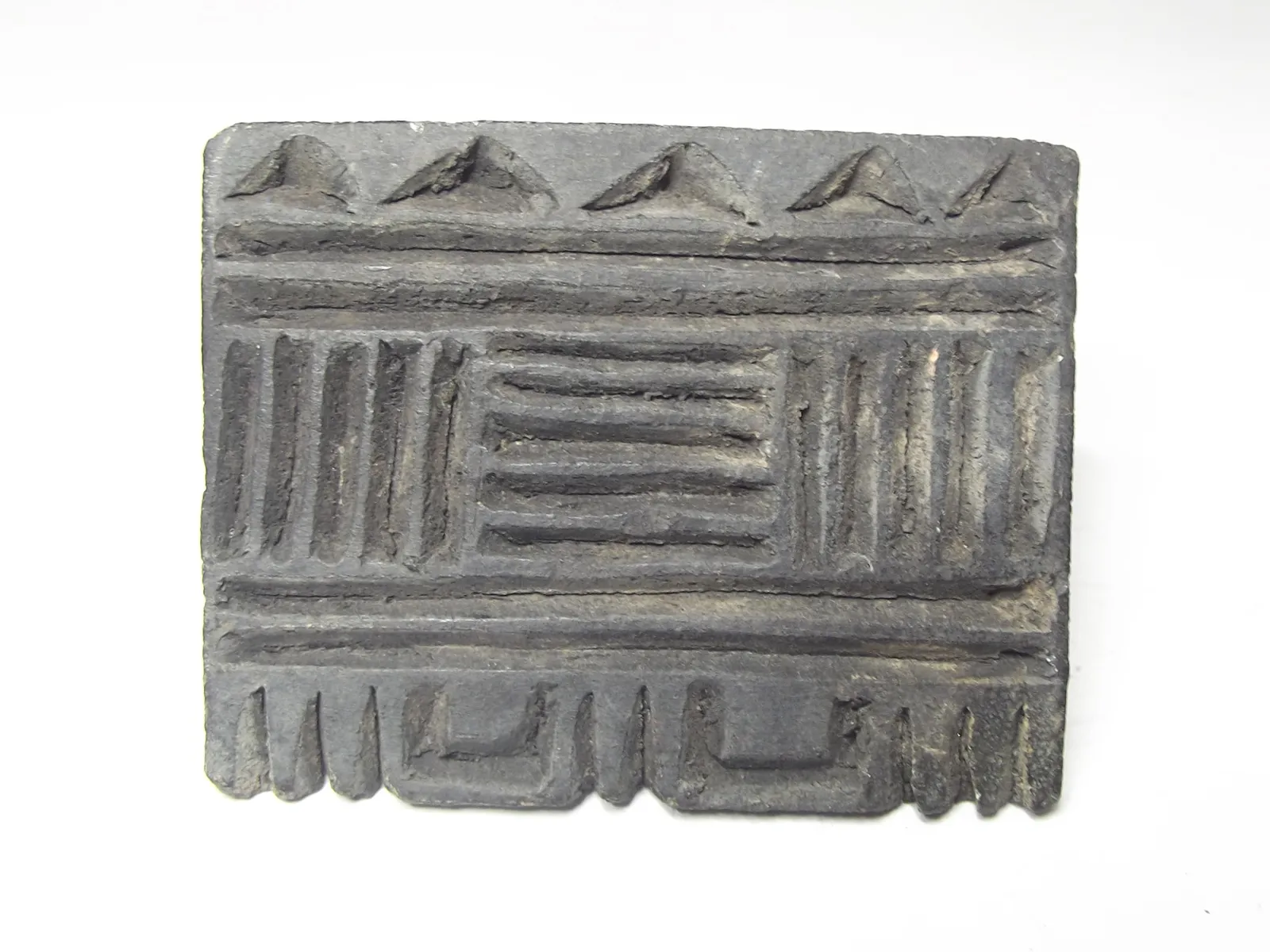 Sello de barro cocido