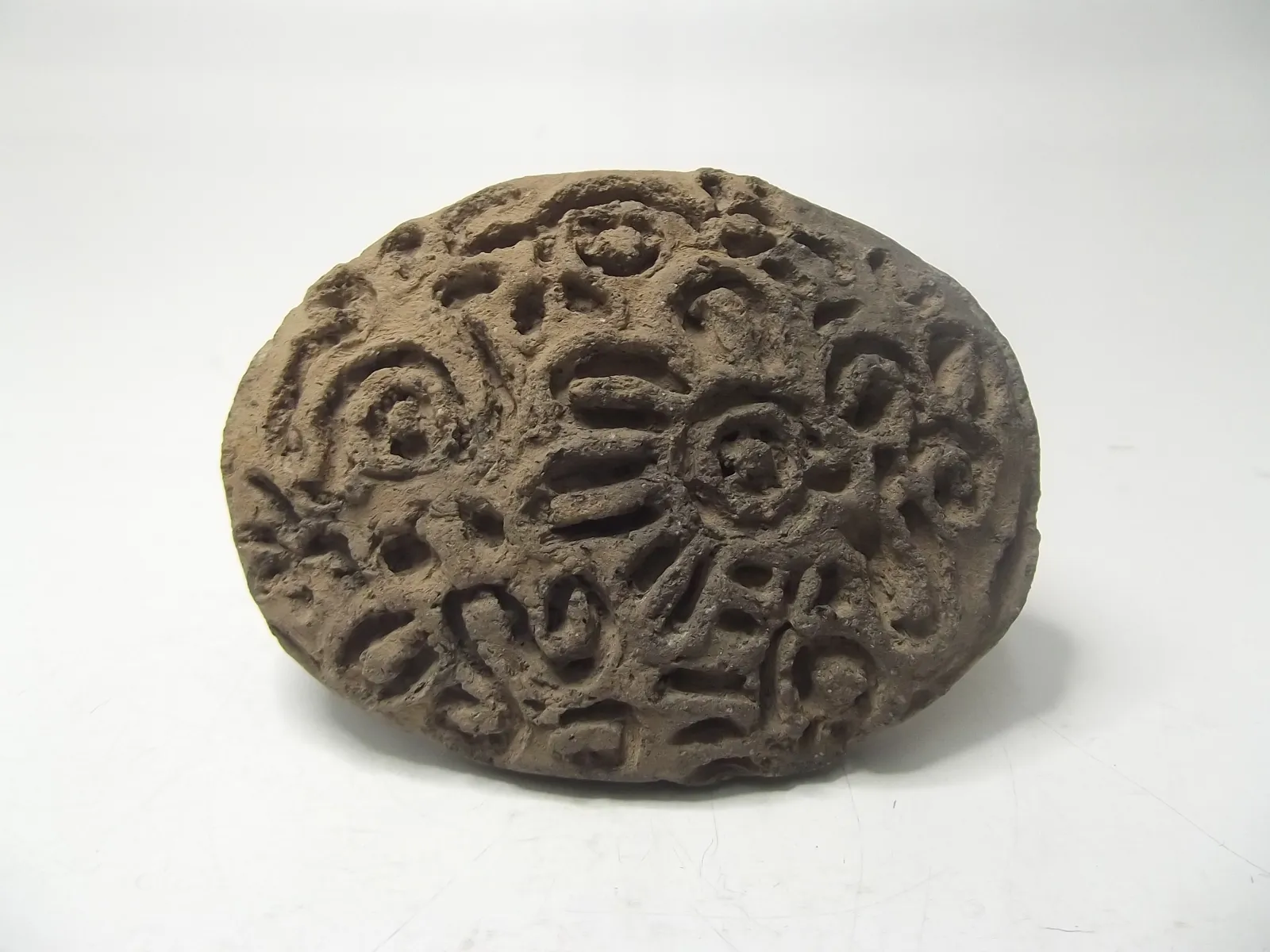 Sello de barro cocido