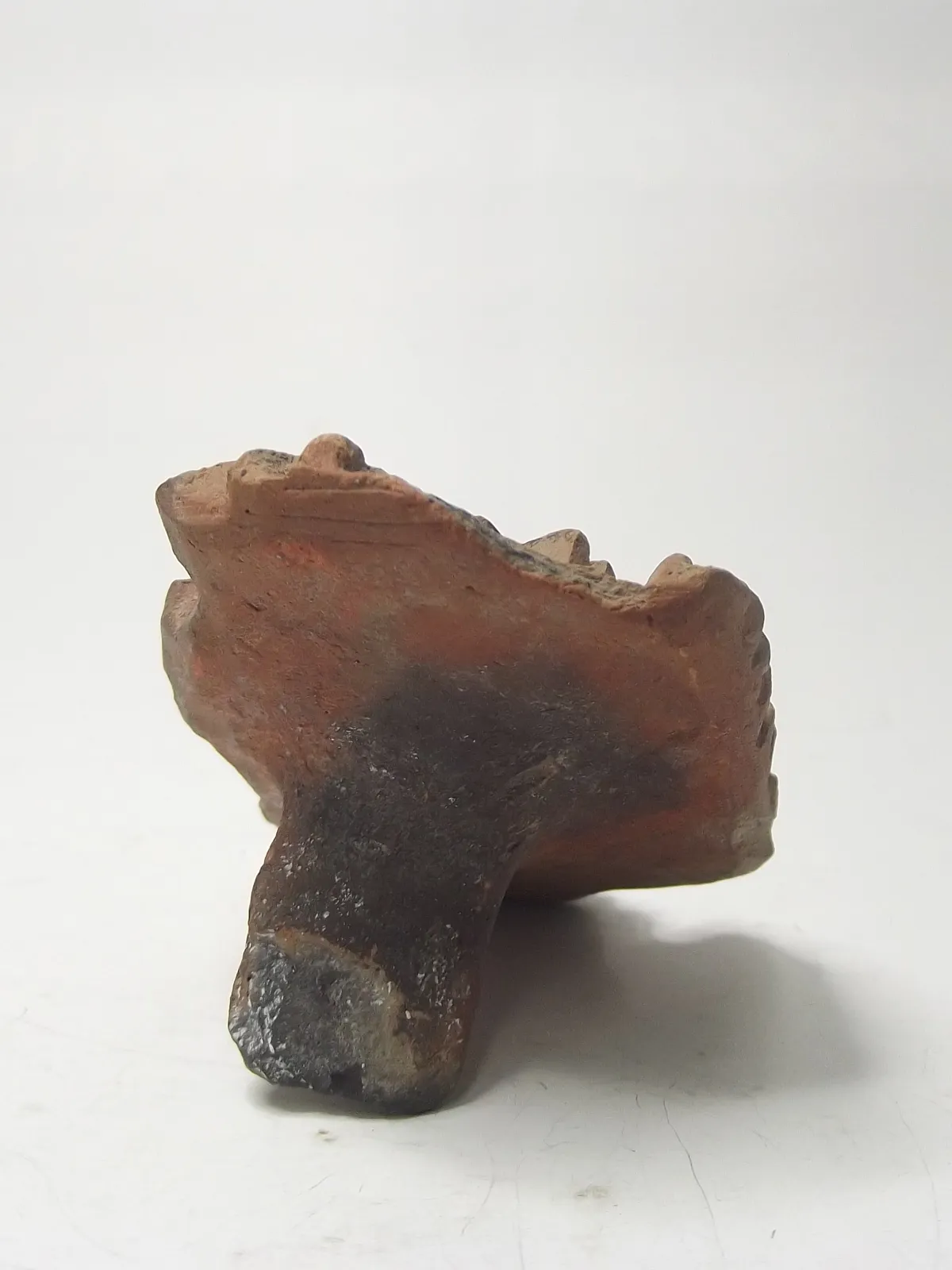 Sello de barro cocido