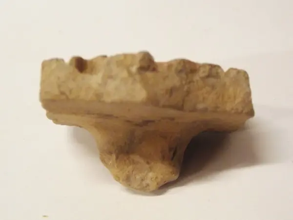 Sello de barro cocido