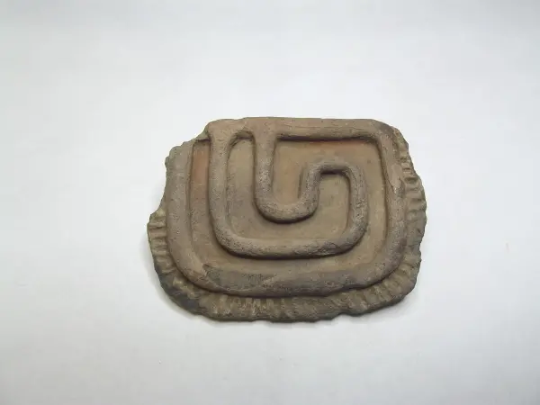 Sello de barro cocido