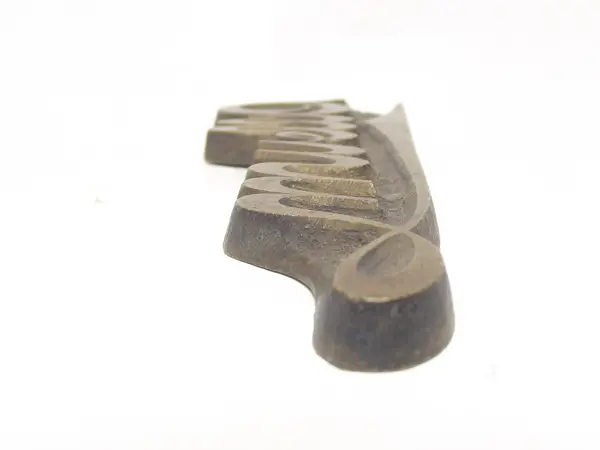Sello de bronce