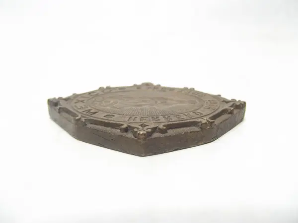 Sello de bronce