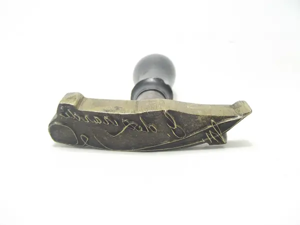 Sello de bronce