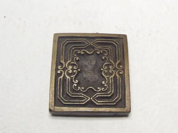 Sello de bronce