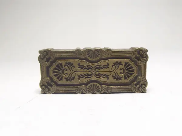 Sello de bronce