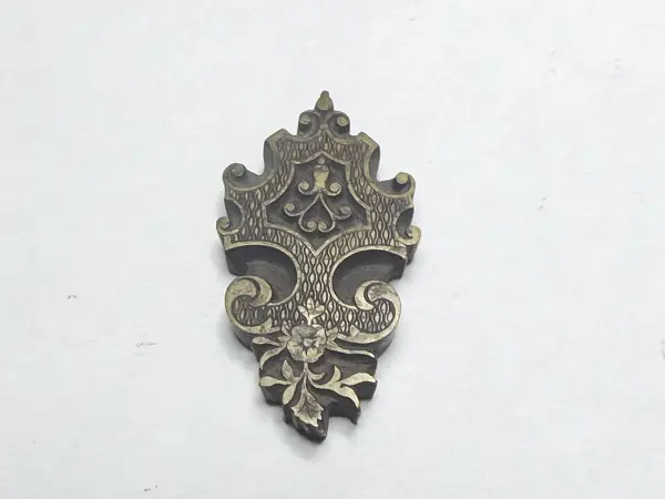 Sello de bronce