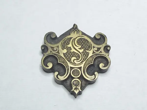 Sello de bronce