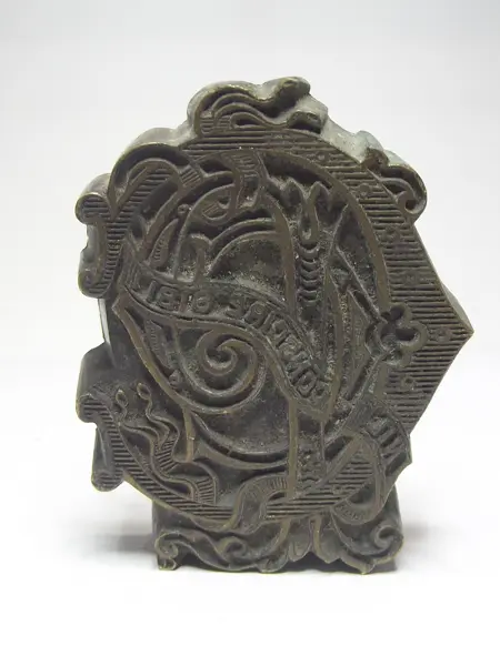 Sello de bronce