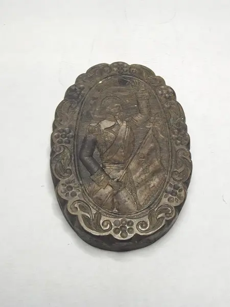 Sello de bronce