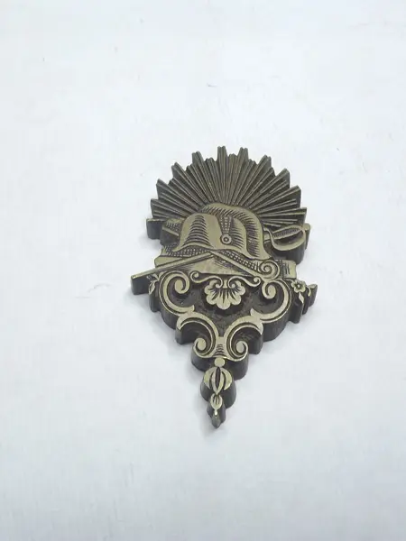 Sello de bronce