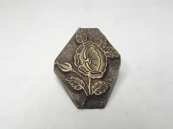 Sello de bronce