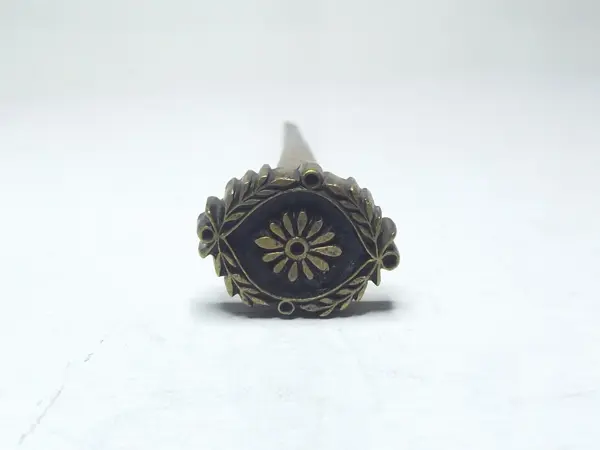 Sello de bronce