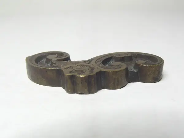 Sello de bronce