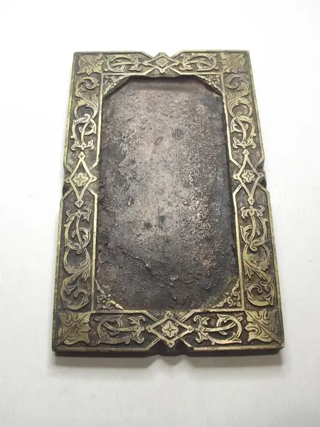 Grabado en bronce
