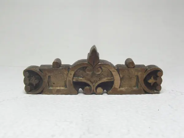 Sello de bronce