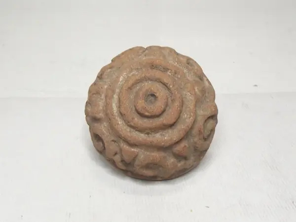 Sello de barro cocido