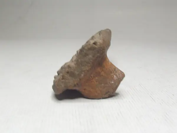 Sello de barro cocido