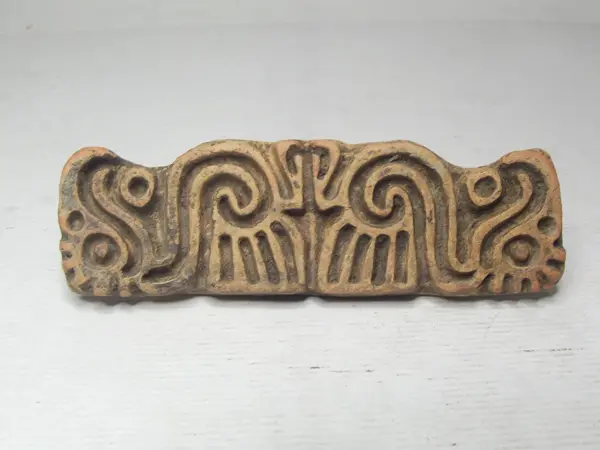 Sello de barro cocido