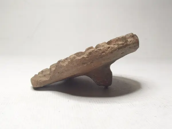 Sello de barro cocido