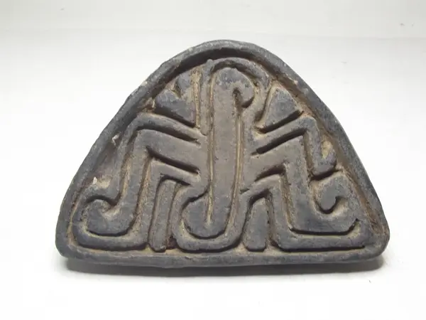 Sello de barro cocido